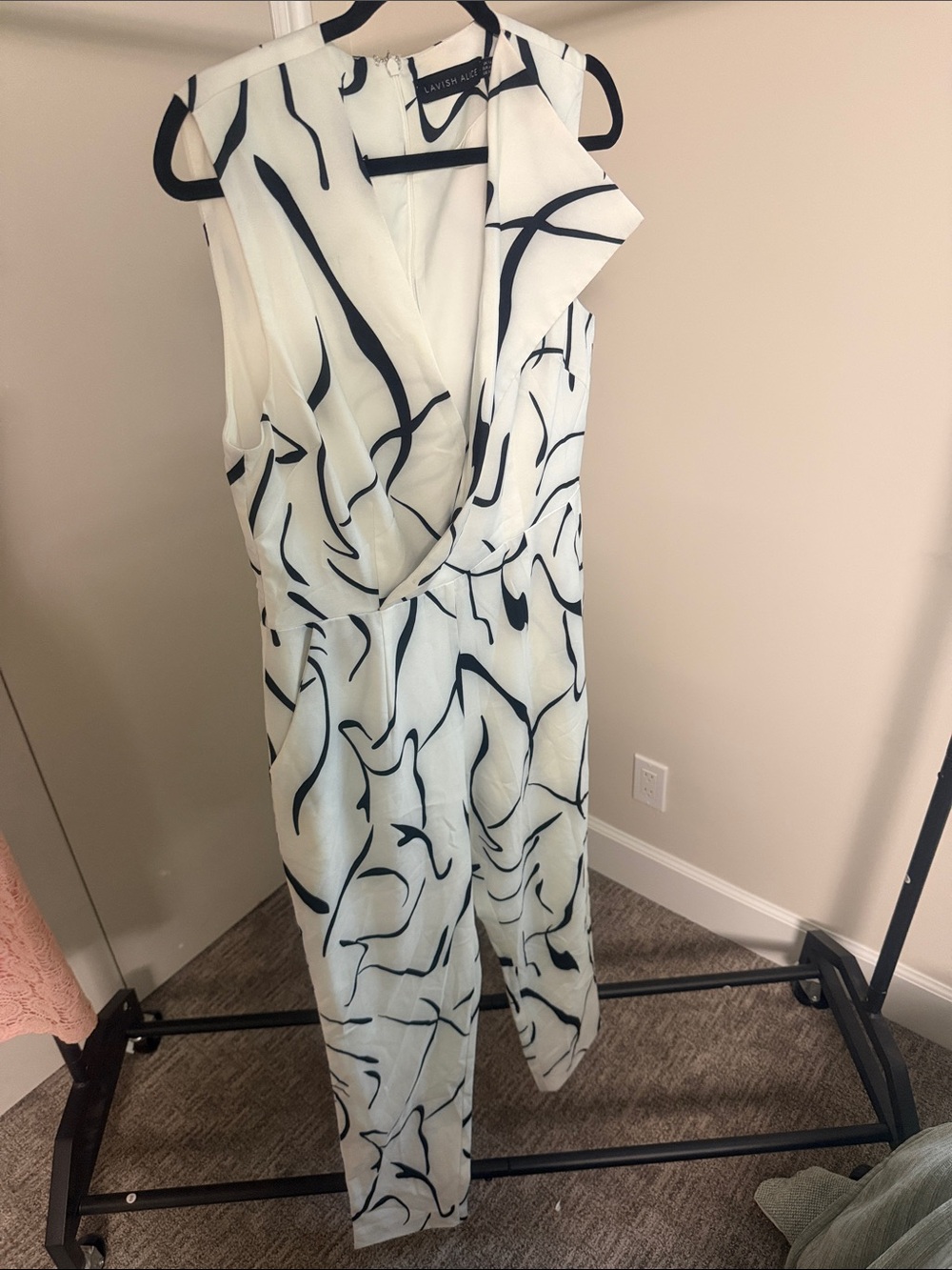 Lavish Alice White Sleeveless Jumpsuit with Black Abstract Print